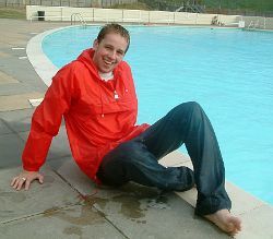 pool boy with anorak in pool