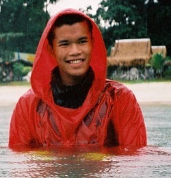 rain swimming in red hiking cape